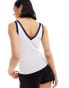 ASOS DESIGN knitted v neck vest in white with contrast navy trim