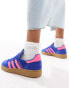 adidas Originals Handball Spezial trainers in yellow and pink with gum sole