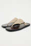 Leather flat sandals with rings