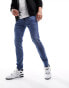 ASOS DESIGN skinny jeans in mid wash blue