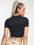 Nike Essential mini swoosh crop t-shirt in black