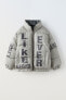 Reversible printed puffer jacket