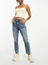 ASOS DESIGN Petite slim mom jeans in mid blue with rip