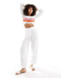 Фото #2 товара ONLY long sleeve open knit crop top in white with stripe