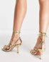 Фото #2 товара ASOS DESIGN – Hiccup – Riemchensandalen in weiter Passform mit Beinschnürung und mittelhohem Absatz in Gold