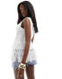 In The Style knitted sleeveless tassel hem top in white