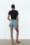 TRF CURVED HIGH-WAIST RIPPED DENIM SHORTS