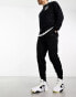 Фото #4 товара Nike Tech Fleece joggers in black