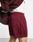 ASOS DESIGN oversized shorts in burgundy sporty mesh