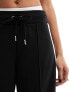 River Island wide leg side stripe jogger in black