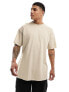 ASOS DESIGN oversized t-shirt in cream with badge back print