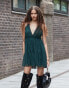 ASOS DESIGN ruffle tiered cami mini dress with lace trim in forest green