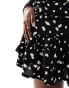 AX Paris ruffle hem mini dress in black and white spot print