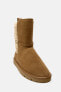 Faux shearling and leather flat ankle boots