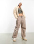 Karl Kani retro cropped puffer jacket in beige corduroy