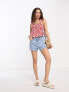 ASOS DESIGN Petite tie strap sun top with pephem in red based ditsy floral print
