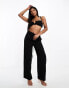 Фото #1 товара Aria Cove elasticated waist wide leg trousers co-ord in black