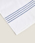 Stitched border cotton towel