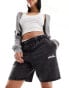 Фото #1 товара ellesse Shabnam shorts in washed black