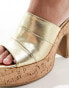 South Beach cork heeled mules in gold