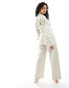 & Other Stories long sleeve jumpsuit with button front and tie waist in light beige