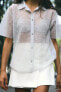 Semi-sheer knit shirt with faux pearls