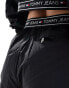 Tommy Jeans baggy taping trackpants in black