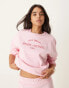 Pieces – Wellness – Sweatshirt in Babyrosa mit „Sports and Running Club“-Print, Kombiteil