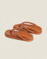 Leather sandals with braided strap