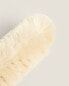 Feather duster with wooden handle