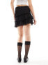 Monki mini ruffle skirt in black M - фото #8