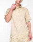 ellesse Capri co-ord shirt with lightning bolt print in beige