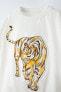 T-shirt with raised tiger design