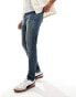 Фото #5 товара ASOS DESIGN skinny jeans with yellow tint in dark wash blue