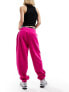 Nike mini swoosh oversized fleece joggers in pink - BPINK