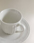 Porcelain coffee cup and saucer