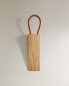 Wooden leather doorstop