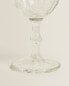 Raised design wine glass