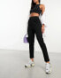 Фото #1 товара ASOS DESIGN jersey tapered tailored trousers in black