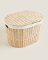 Oval fabric-lined laundry basket