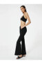 Фото #2 товара Леггинсы и тайтсы Koton модель Тайт Панталон с нормальной посадкой и испанским подолом