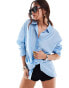 Фото #1 товара Vero Moda oversized shirt with double button open back detail in light blue