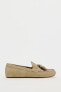 Split suede loafers with tassels