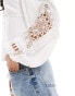 ASOS DESIGN balloon sleeve crinkle blouse with cutwork detail in white