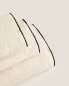 Cotton towel with overlock