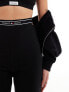 Tommy Jeans logo taping legging shorts in black