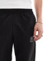 Le Coq Sportif Paris 2024 Olympics joggers in black Черный, XL - W40-42 - фото #5