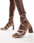 Фото #1 товара ASOS DESIGN Hideout strappy tie leg mid block heeled sandals in gold