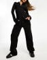 Фото #2 товара In The Style ribbed wide leg trousers co-ord in black