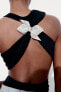 Bodysuit with rhinestone bow